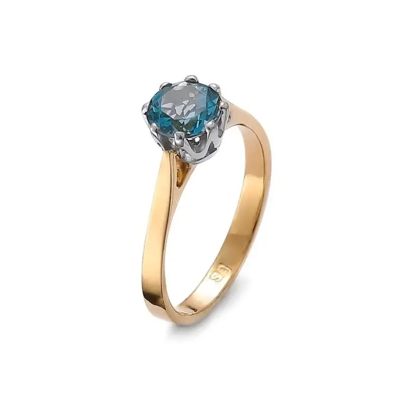 Złoty pierścionek z topazem