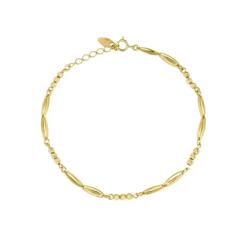 Złota bransoletka z kulkami i podłużnymi elementami Złota bransoletka z kulkami i podłużnymi elementami